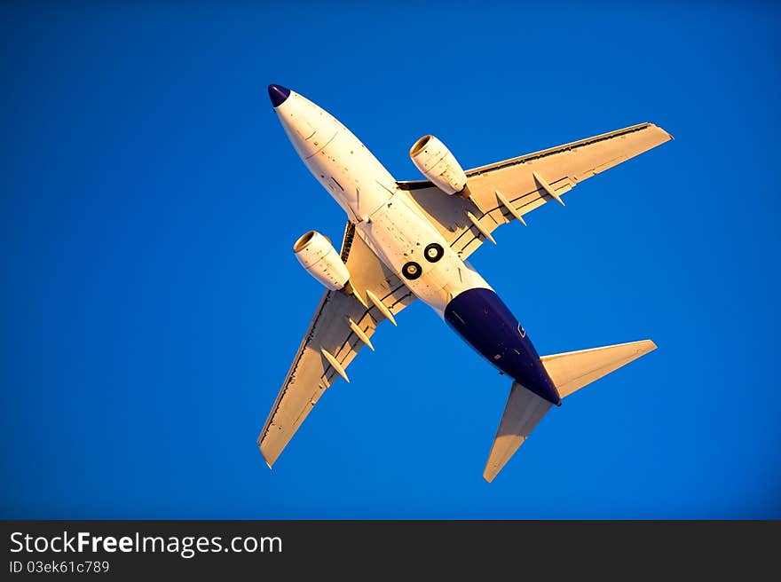 Plane in the blue sky. Plane in the blue sky