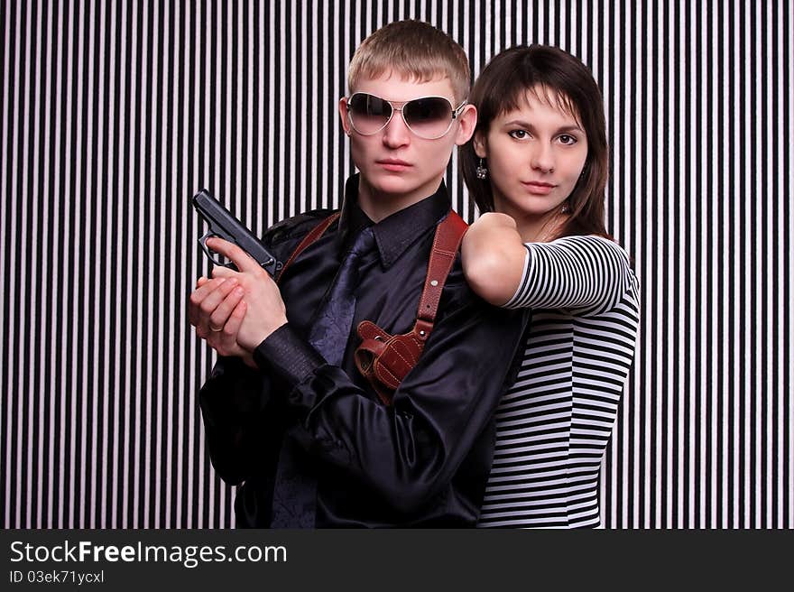 Young beautiful couple over stripe background. Young beautiful couple over stripe background