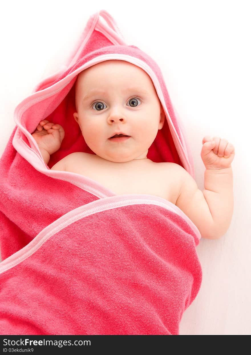 Surprised kid looks at a white background. Surprised kid looks at a white background.