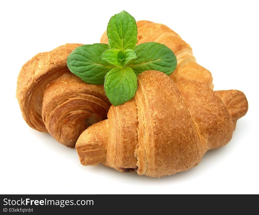 Fresh croissants with mint