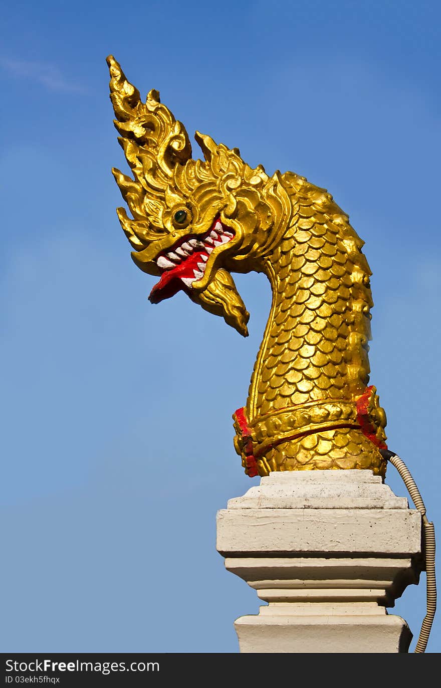 Golden Naga head in Temple of Thailand