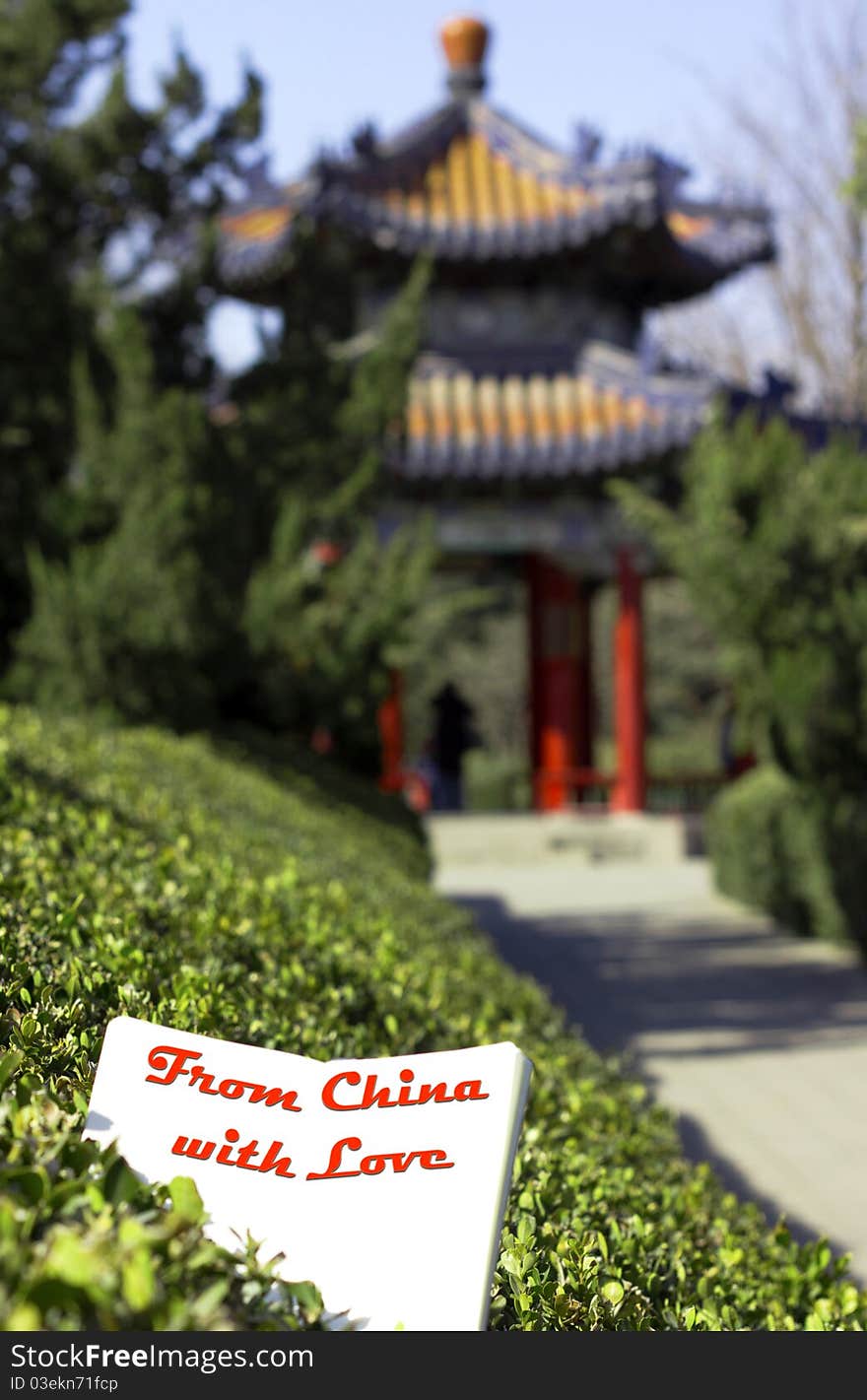 Opened white notebook on background of traditional Chinese pavilion