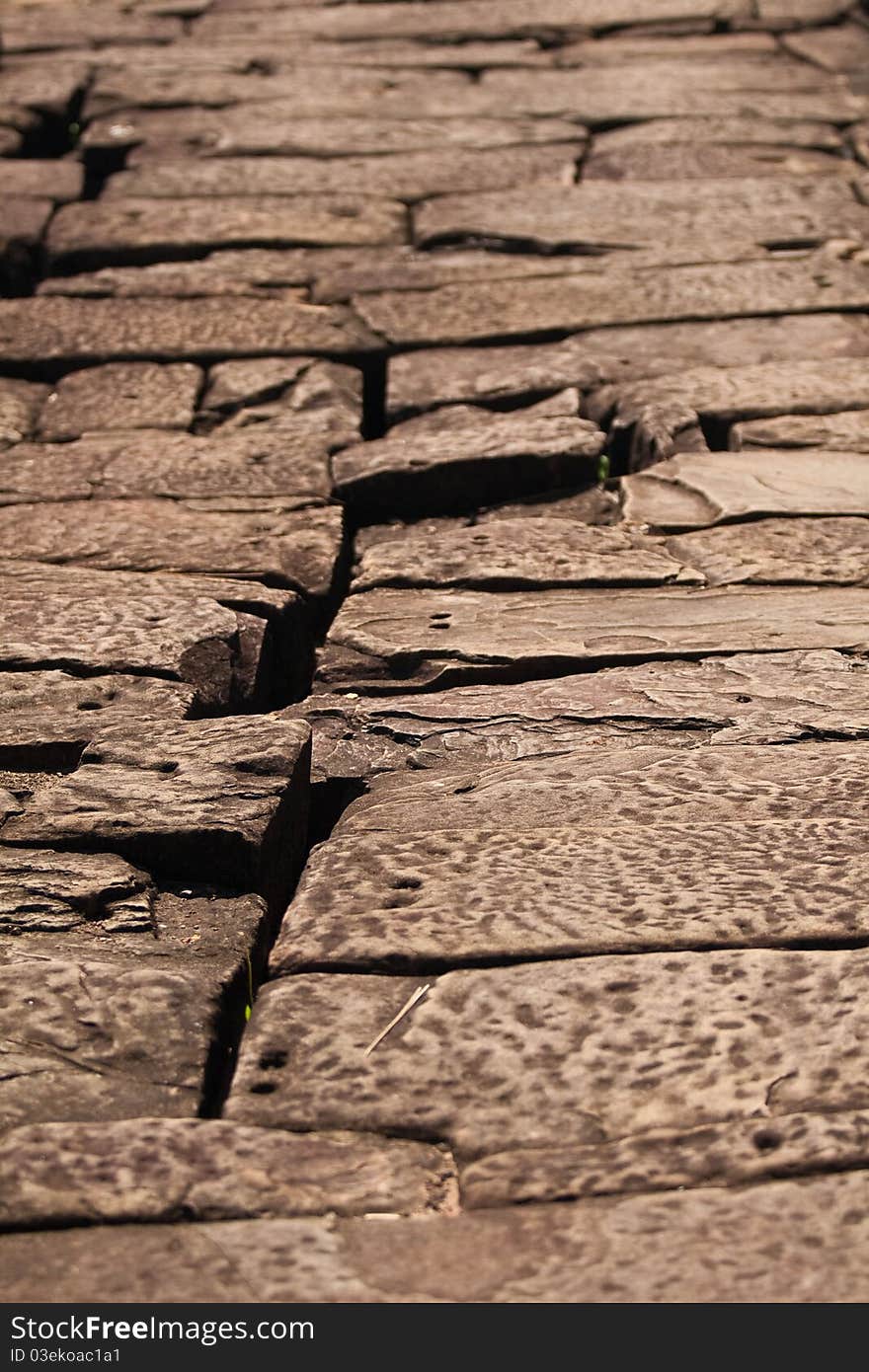 Old ruined paving blocks background