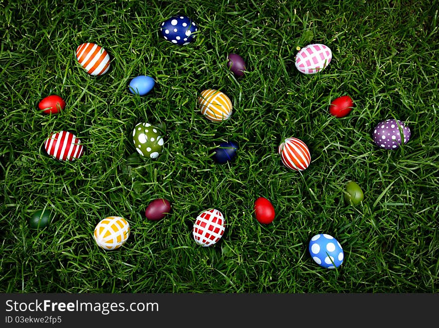 Hand-painted Easter eggs, hidden in the grass