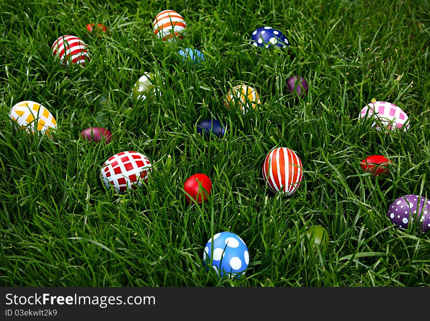 Hand-painted Easter eggs, hidden in the grass