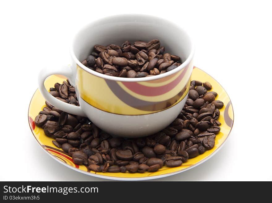 Coffee beans in the coffee cup