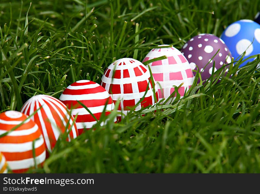 Hand-painted Easter eggs, hidden in the grass