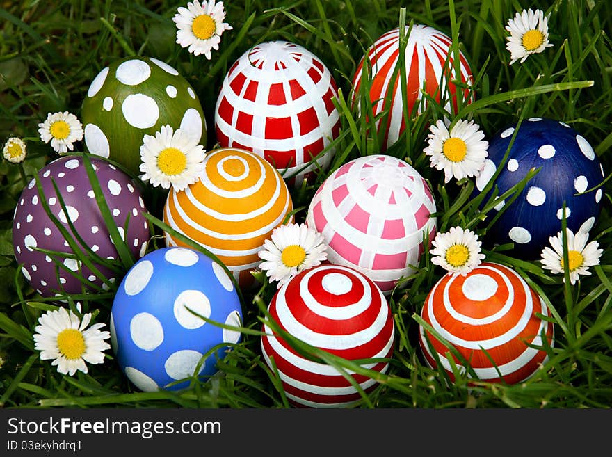 Hand-painted Easter eggs, hidden in the grass