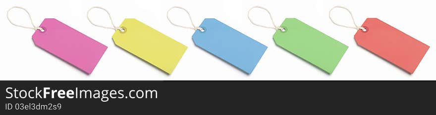 Five blank, coloured price or luggage tags. Isolated on white. Five blank, coloured price or luggage tags. Isolated on white.