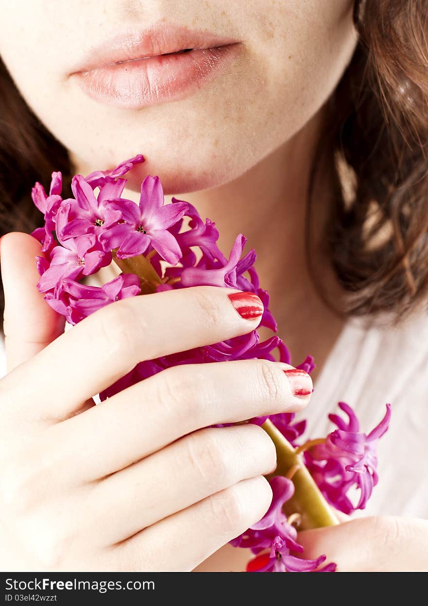 Girl with beautiful and fresh hyacinth. Girl with beautiful and fresh hyacinth