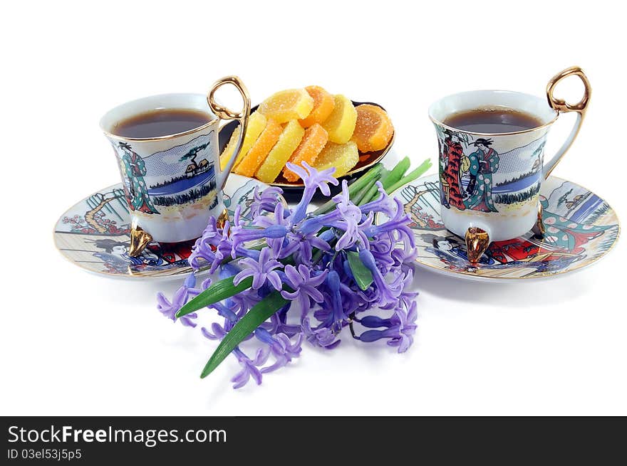 Two Cups Of Coffee With Flowers