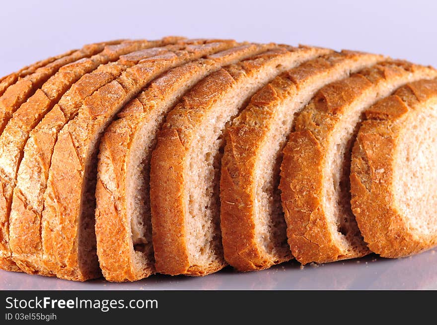 Loaf of sliced bread isolated on a white background