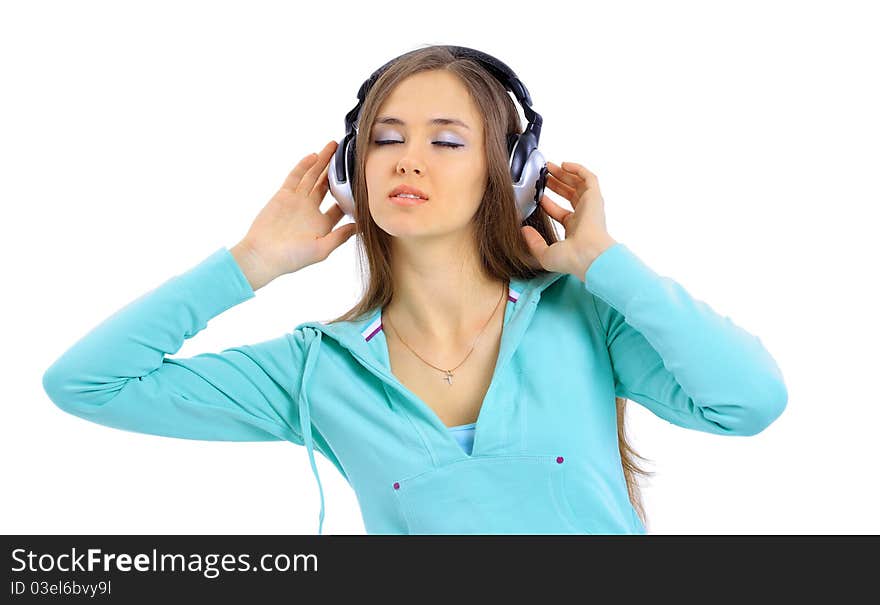 Beautiful women listening music in headphones