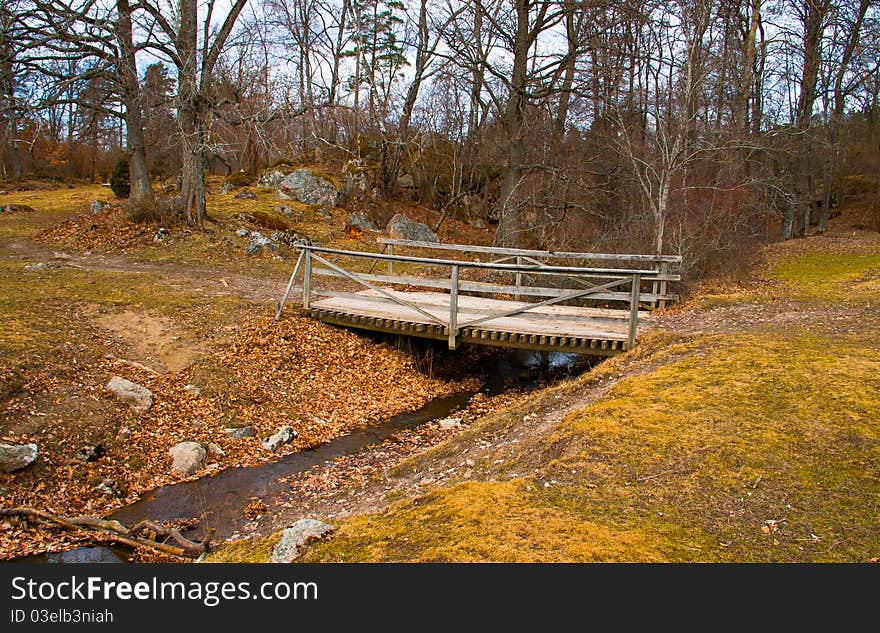 A bridge on a grass field