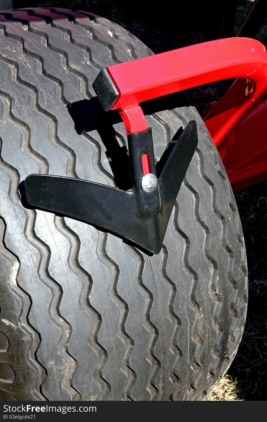 A new black tractor's tyres