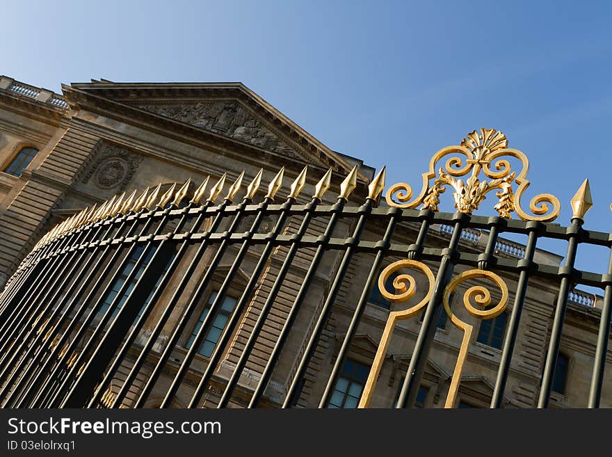 Fence with golden details in Paris, France. Fence with golden details in Paris, France