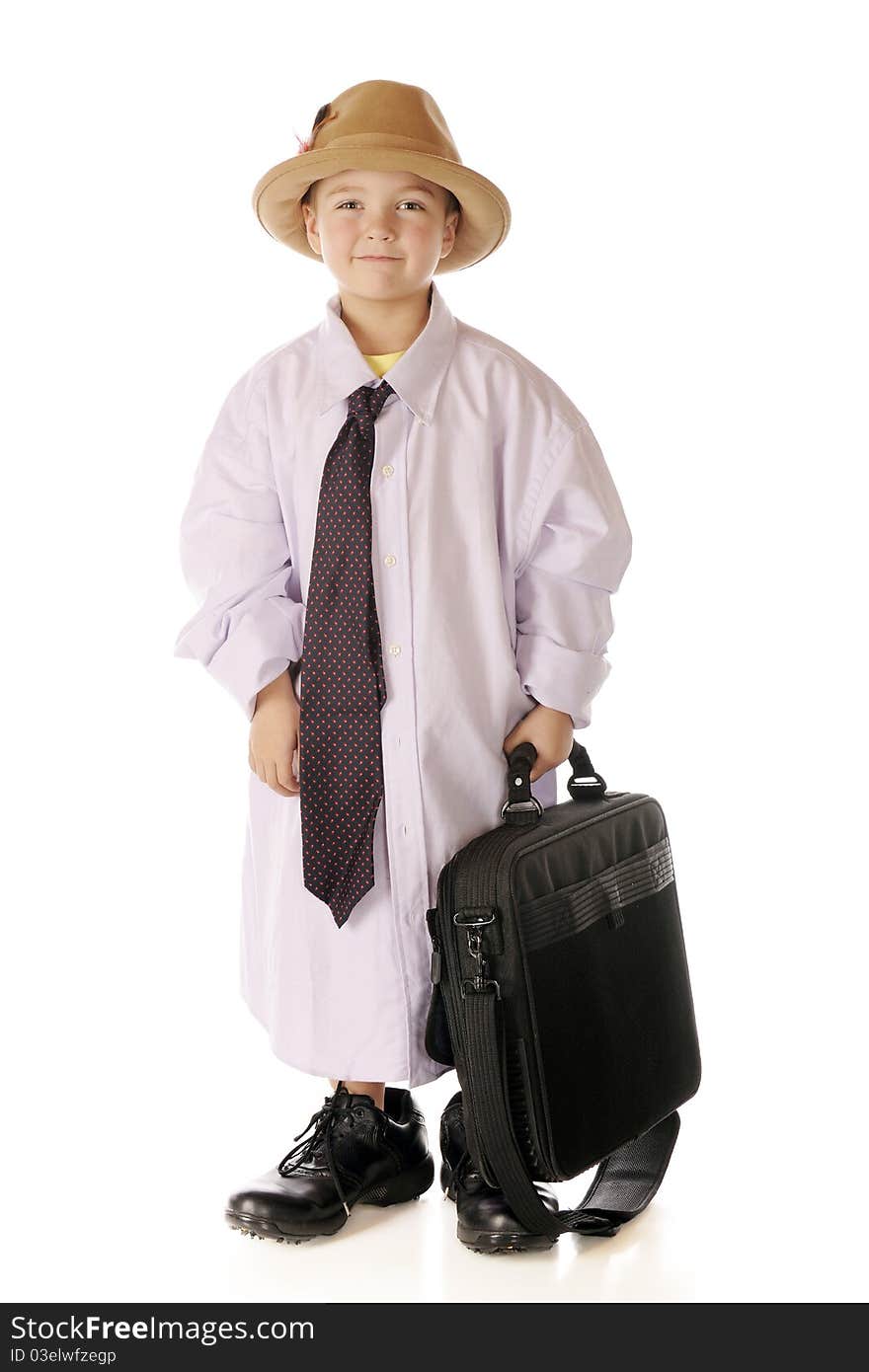 A happy kindergarten boy carrying a computer case in his grandpa's clothes. Isolated on white. A happy kindergarten boy carrying a computer case in his grandpa's clothes. Isolated on white.