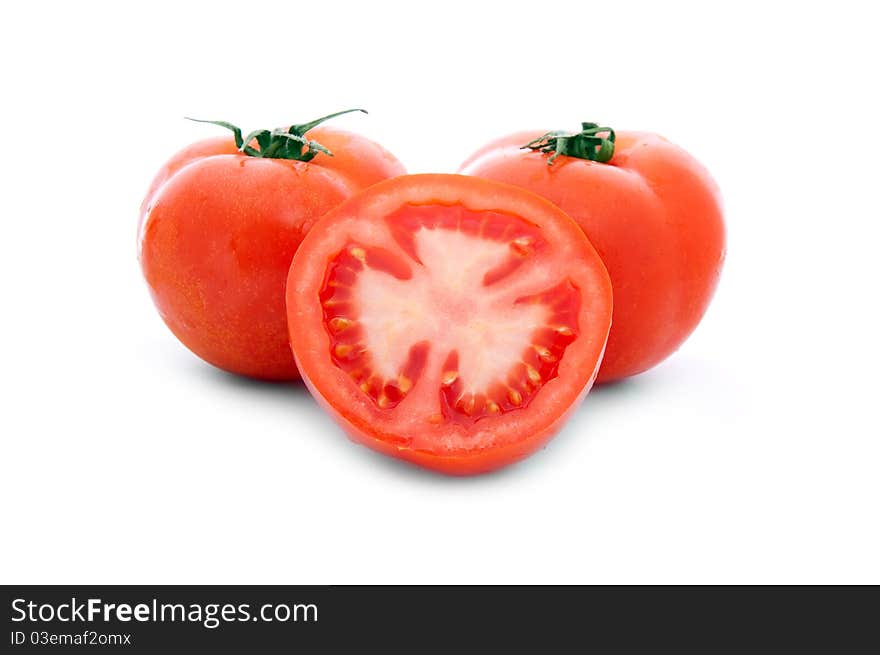 Close up shot of red tomatoes isolated on white background