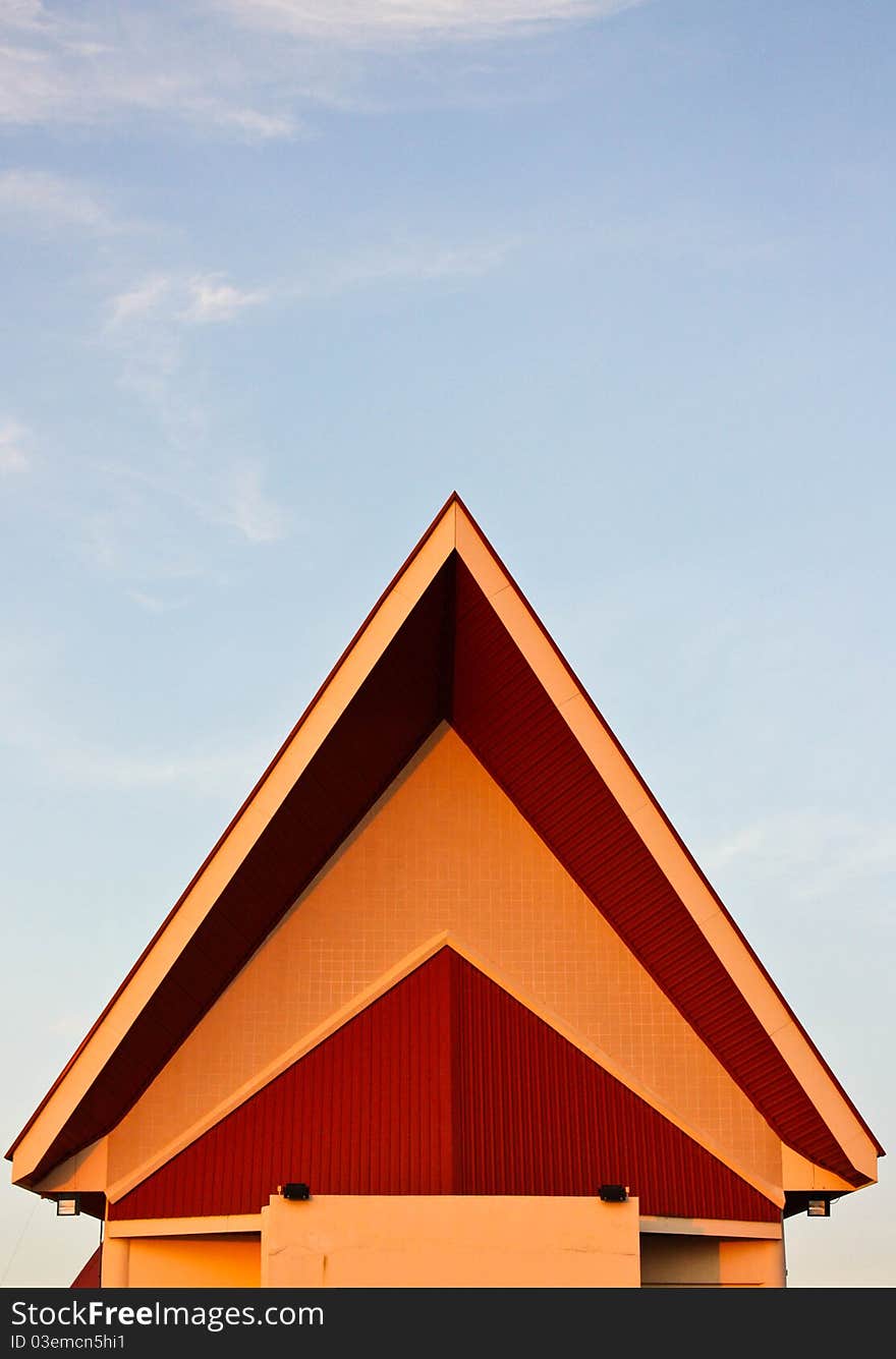 Red roof of isosceles building