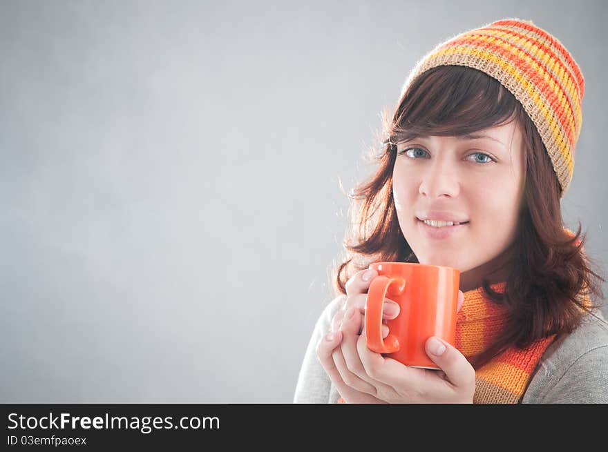 Woman holding a cup of coffee. Woman holding a cup of coffee