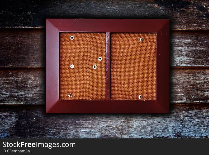 Photo frame on wooden background