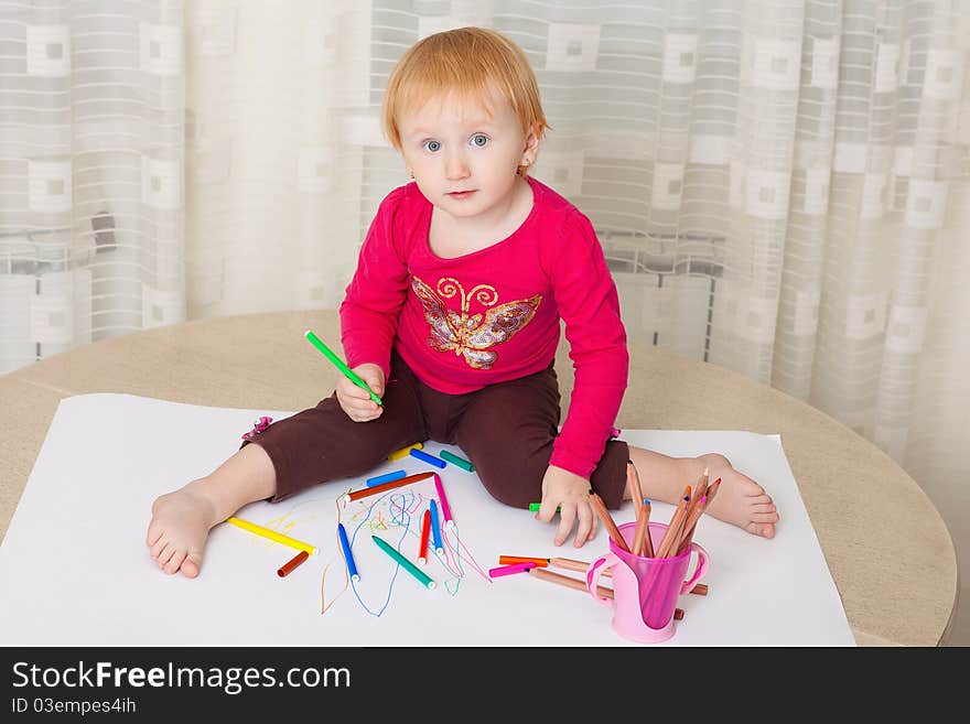 Kid drawing picture at home