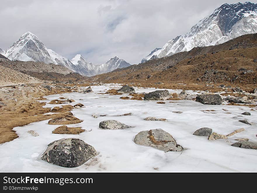 Ice remains on the grounds at high altitude in one of the mountain ranges in the Nepalese Himalayas