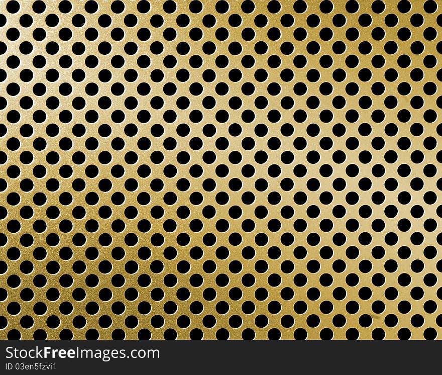 Golden metal grille surface