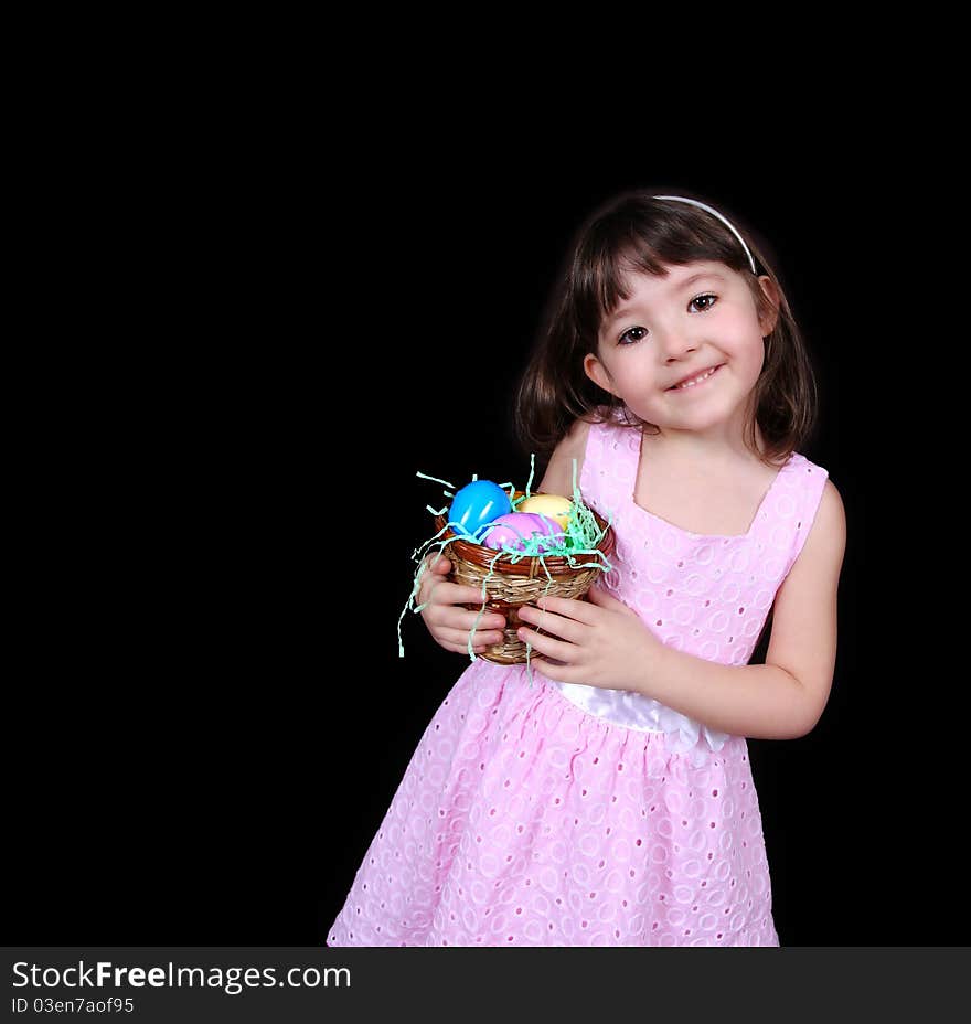 Sweet Girl Holding Basket Of Bright Easter