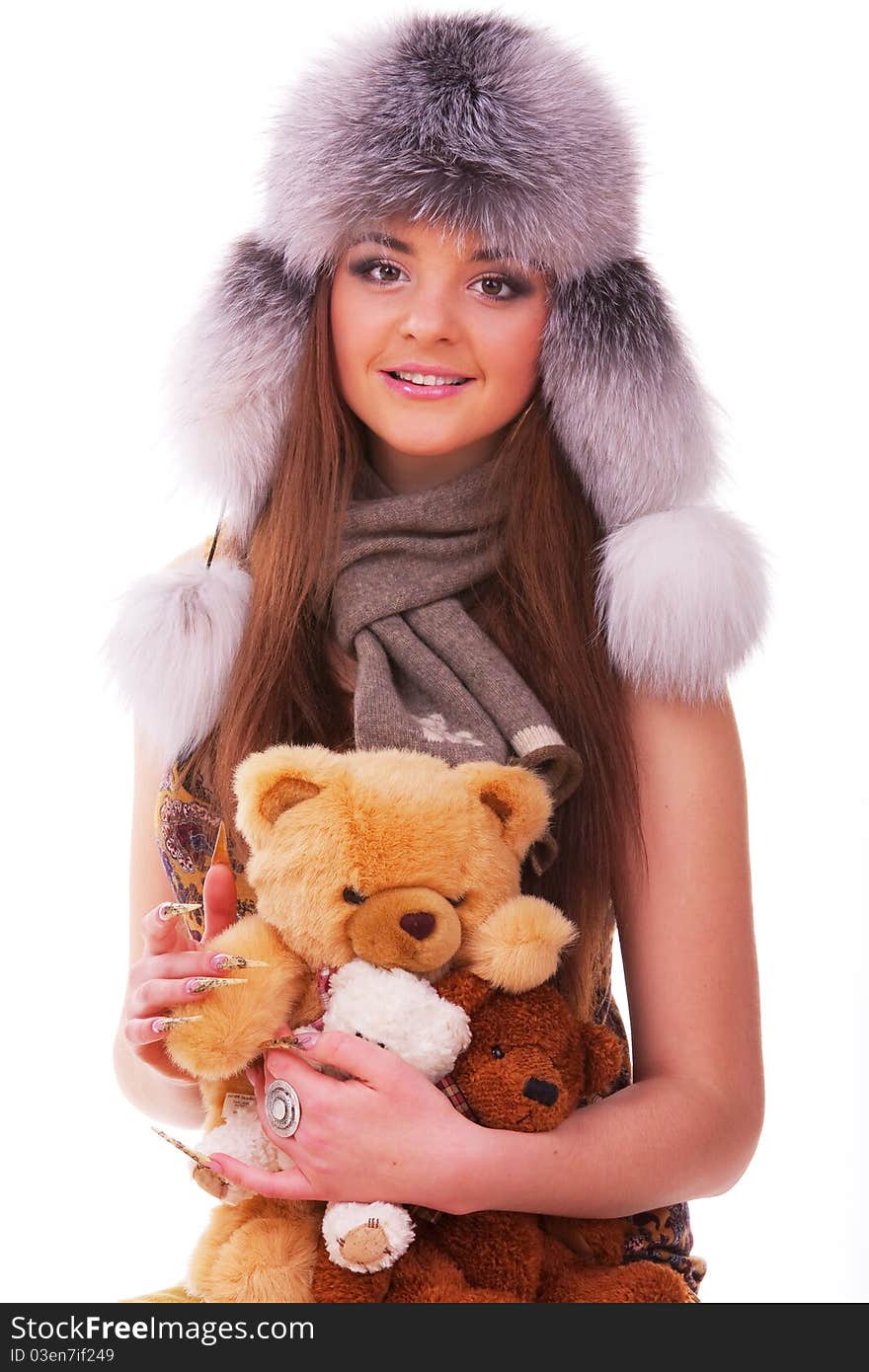 Beautiful longhair girl is holding the teddy bears. Beautiful longhair girl is holding the teddy bears