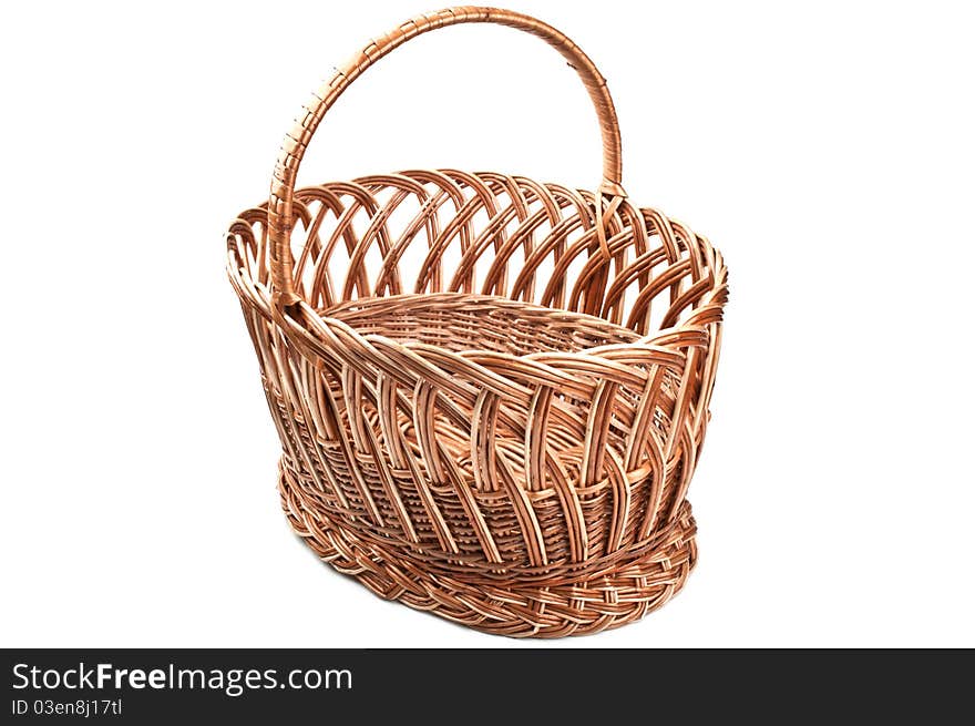 Wicker basket isolated on a white background