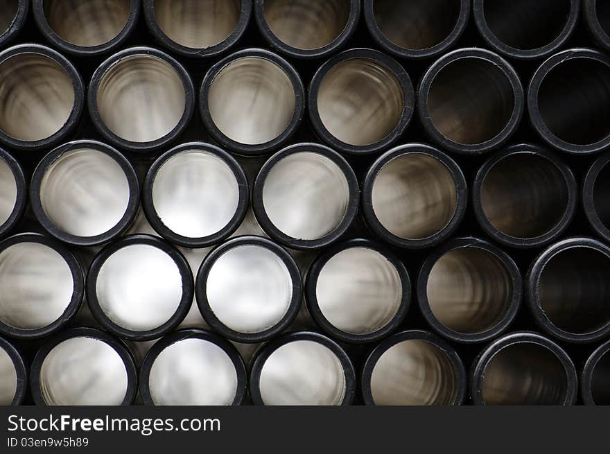 Rows of Pipes creating a Pattern, Stacked, Light Beam Radiation. Rows of Pipes creating a Pattern, Stacked, Light Beam Radiation