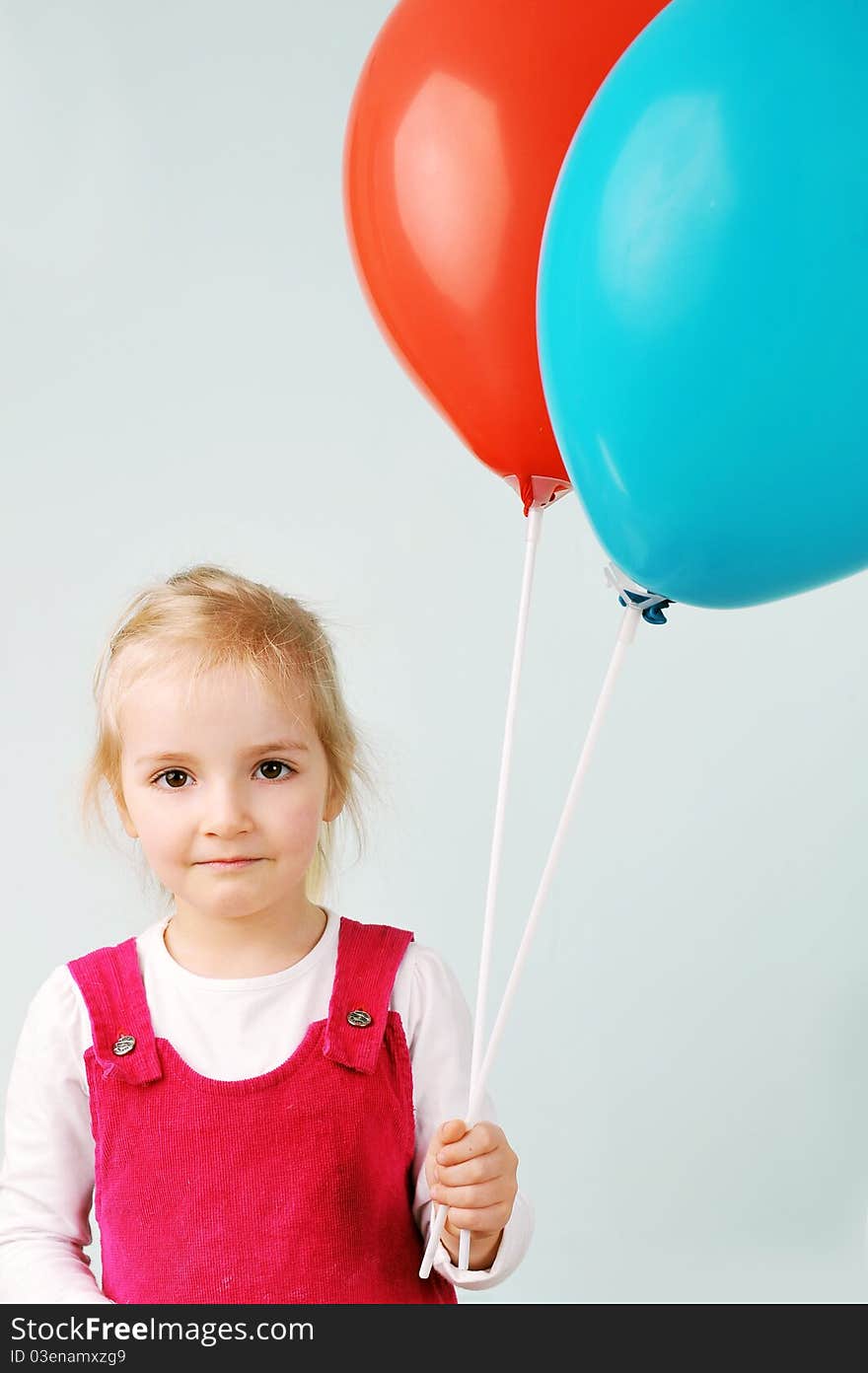 Beautiful little girl playing with balloons. Beautiful little girl playing with balloons