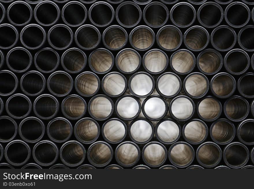 Rows of Pipes creating a Pattern, Stacked, Light Beam Radiation. Rows of Pipes creating a Pattern, Stacked, Light Beam Radiation