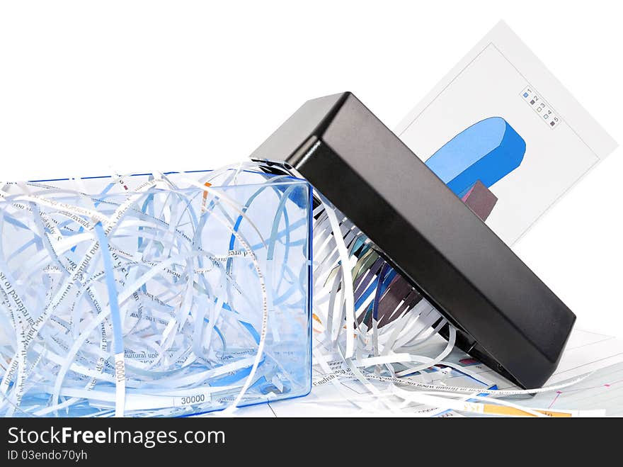 Shredder destroys the business document. Shredder destroys the business document