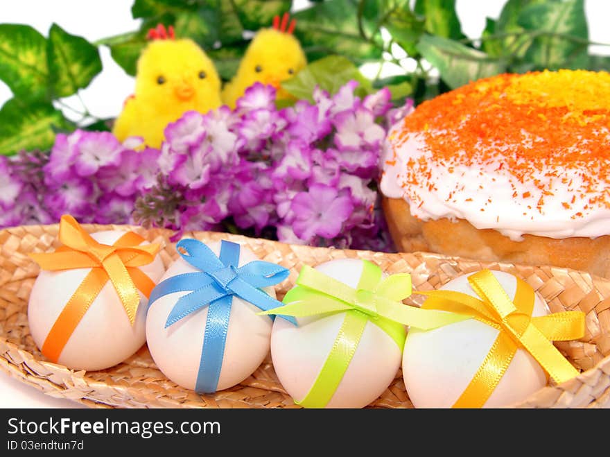 Easter background with cake, eggs and two chicken