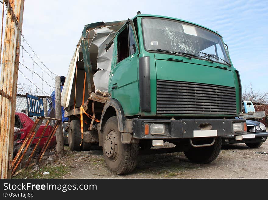 Damaged truck after car accident