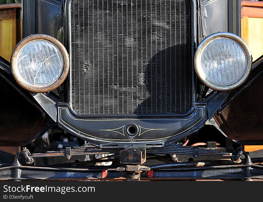 A Closeup Of The Front Of An Antique Pickup Truck. A Closeup Of The Front Of An Antique Pickup Truck