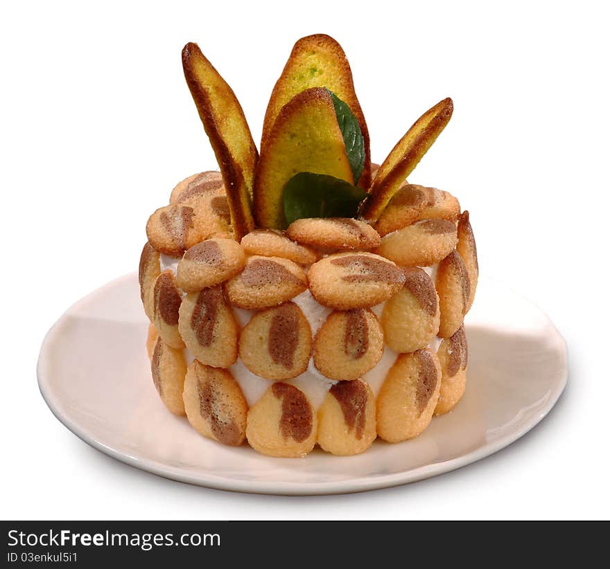 Cake on the isolated background decorated with fried bread