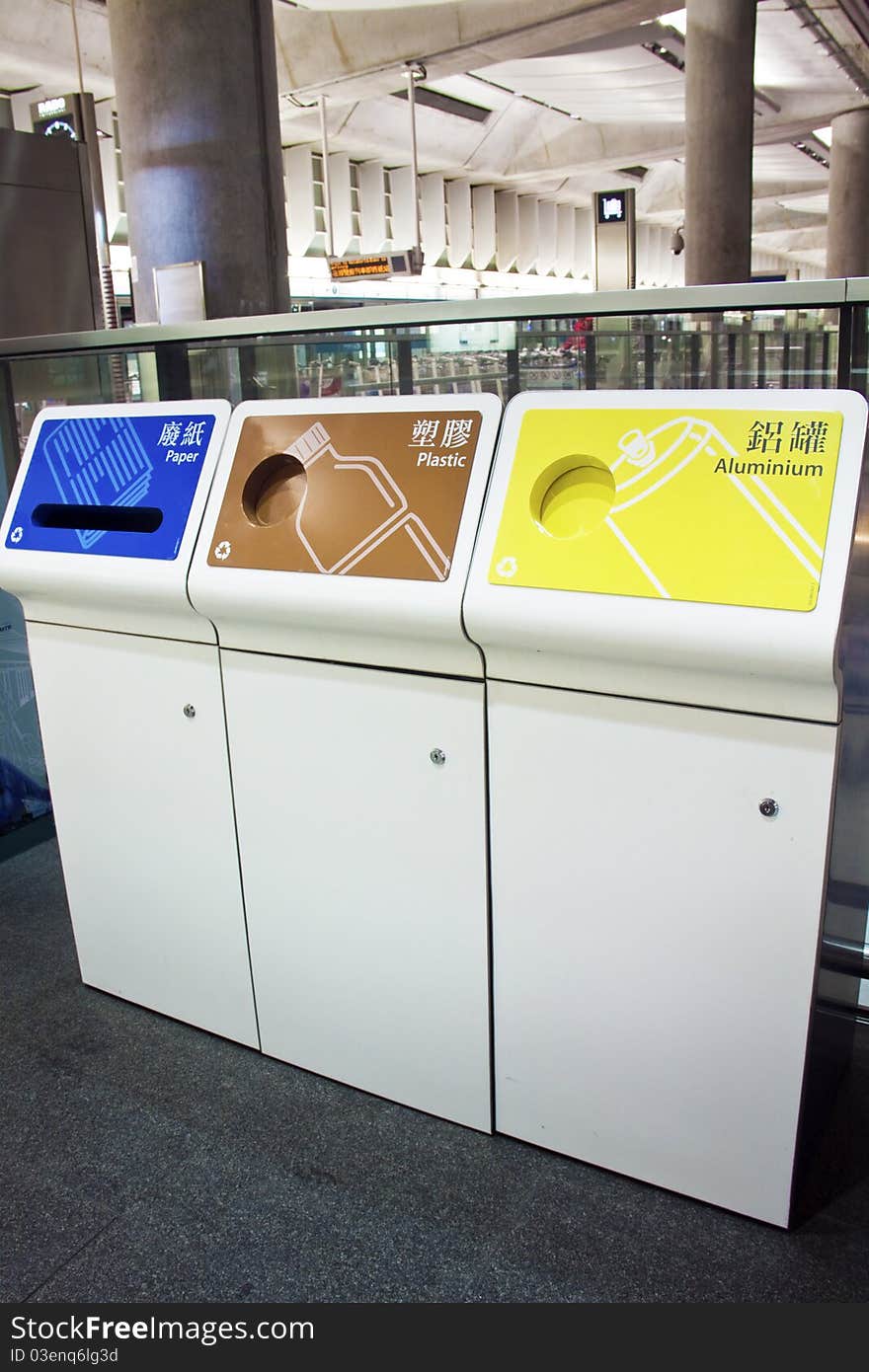 Recycle bins for paper, plastic, and aluminium.