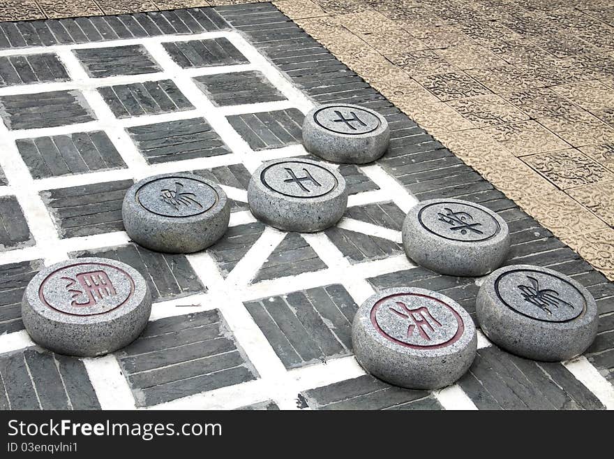 Stone chinese chess in the park.