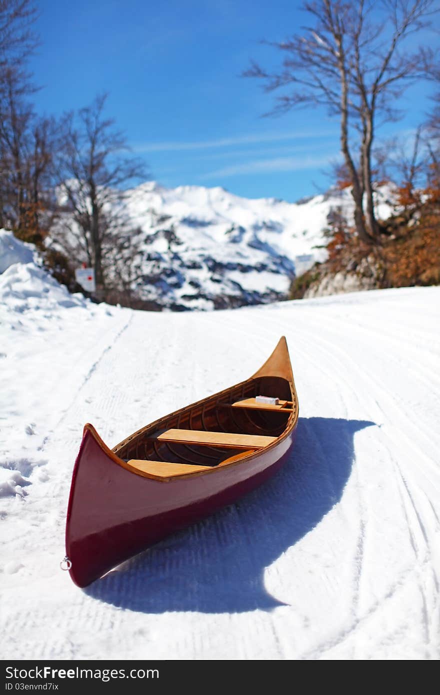 Wooden Canoe On The Snow