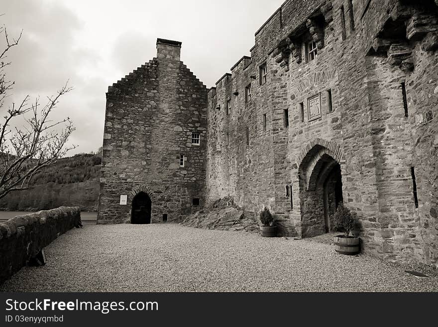 A stone entrance to a castle. A stone entrance to a castle