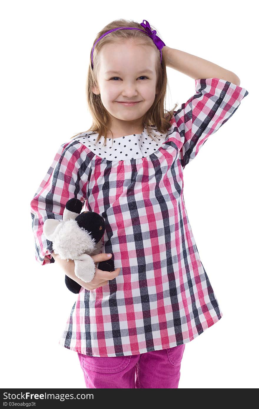 Little girl hugging her loved Teddy bear. Little girl hugging her loved Teddy bear.