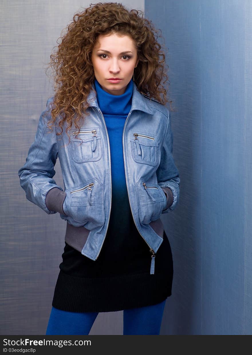 Young woman in a denim jacket