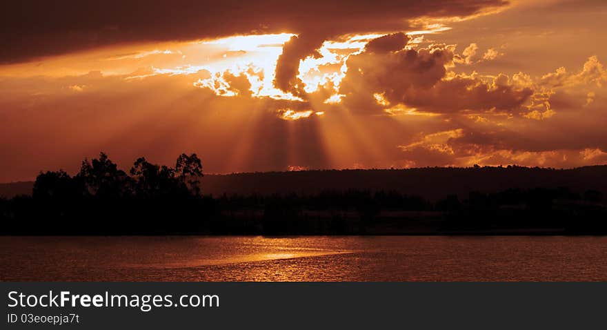 Sunrays Over Water