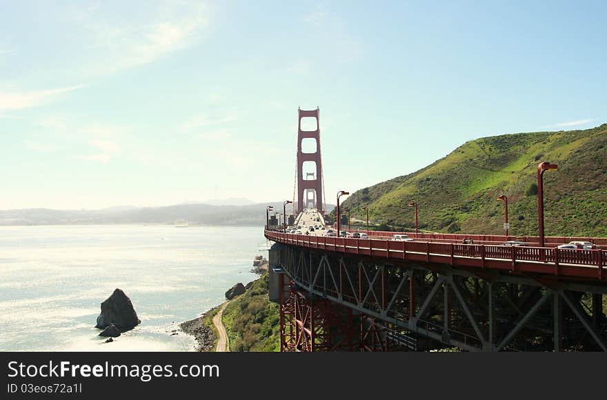 Taken in 2004 during a road trip to San Francisco. The rock stay quietly and isolated from the busy bridge gave me a calm and peaceful moment when looking at the scene. Taken in 2004 during a road trip to San Francisco. The rock stay quietly and isolated from the busy bridge gave me a calm and peaceful moment when looking at the scene.