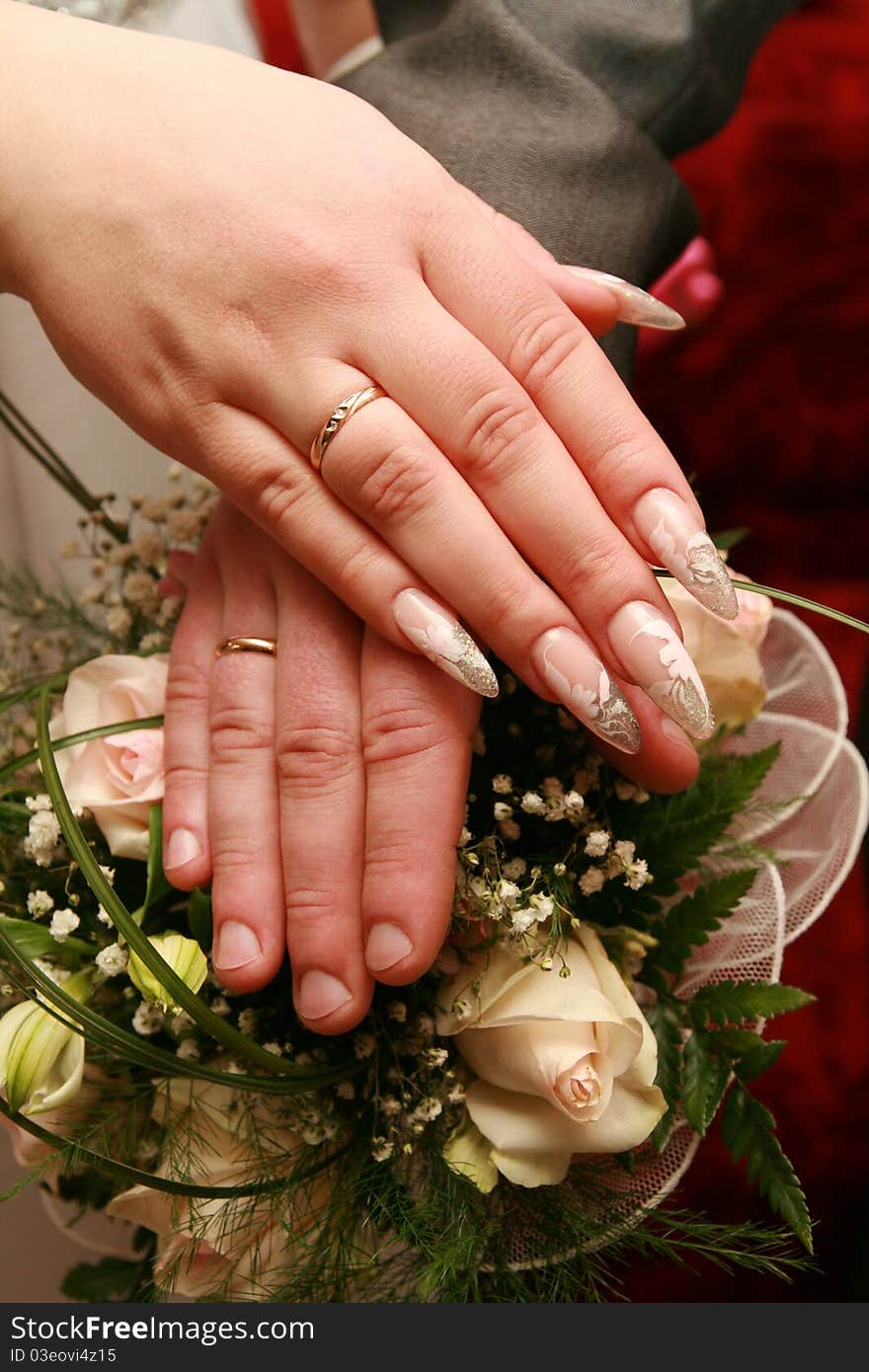 Just Married - Holding Hands on the bride's bouquet