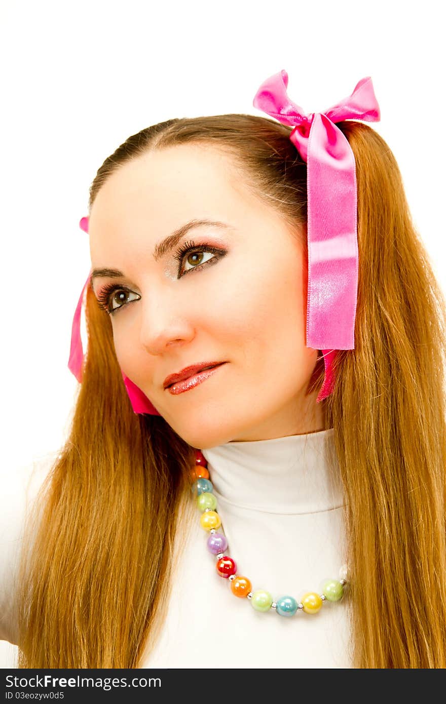 Girl with two tails and pink ribbons on white isolated background