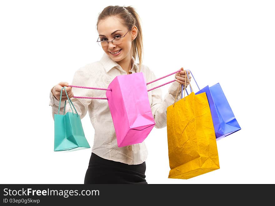 Businesswoman with shopping bags over white. Businesswoman with shopping bags over white